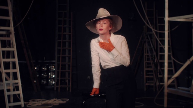 Video Reference: Performance, Hat, Headgear, Stage, heater, Performing arts, Event, Drama, Performance art, Acting, Person