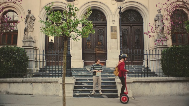 Video Reference: Architecture, Wall, Kick scooter, Vehicle, Tree, Recreation, Arch, Building, Facade, Tourism