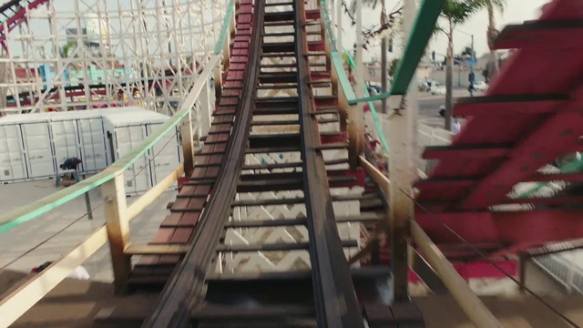 Video Reference: Amusement ride, Amusement park, Stairs, Roller coaster, Nonbuilding structure, Park, Recreation, Vehicle, Escalator, Person