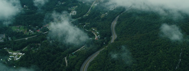 Video Reference: Aerial photography, Atmospheric phenomenon, Geological phenomenon, Highland, Birds-eye view, Forest, Mountain pass, Landscape, Land lot, Road