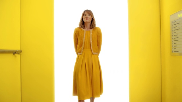 Video Reference: Clothing, Yellow, Dress, Orange, Neck, Fashion, Sleeve, Outerwear, Day dress, Fashion model