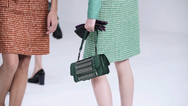 Video Reference: Clothing, Green, Pencil skirt, Fashion, Waist, Plaid, Pattern, Street fashion, Tartan, Design, Person