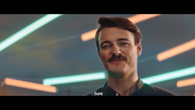 Video Reference: Face, Facial hair, Chin, Beard, Forehead, Cheek, Fun, Smile, Moustache, Jaw, Person, Rainbow, Monitor, Screen, Photo, Man, Front, Uniform, Wearing, Holding, Woman, Standing, Black, Smiling, White, Television, Blue, Large, Player, Table, Display, Hat, Mirror, Baseball, Screenshot, Human face, Text