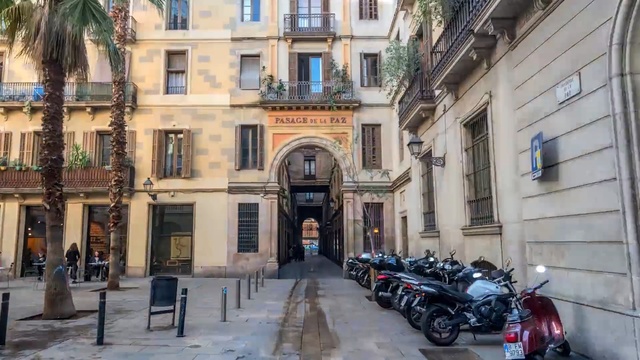 Video Reference: Neighbourhood, Town, Building, Street, Human settlement, City, Architecture, Mixed-use, Facade, Apartment, Person