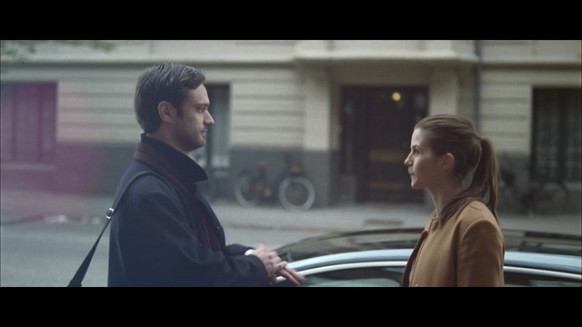 Video Reference: car, mode of transport, snapshot, screenshot, vehicle, family car, interaction, film, girl, conversation, Person