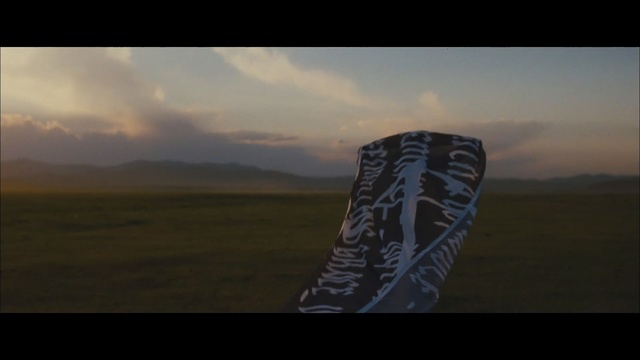 Video Reference: sky, ecosystem, mode of transport, ecoregion, atmosphere, steppe, geological phenomenon, cloud, plain, morning, Person