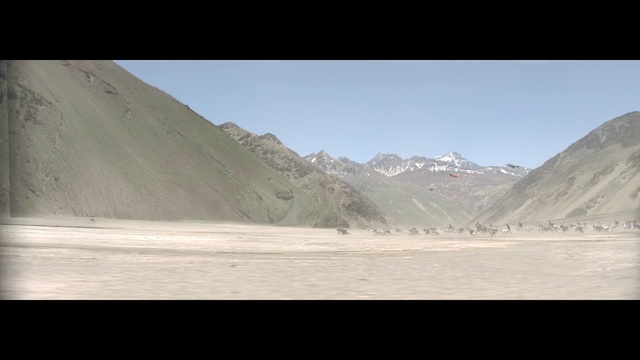 Video Reference: Mountainous landforms, White, Mountain, Sky, Mountain range, Highland, Valley, Ecoregion, Geological phenomenon, Wadi