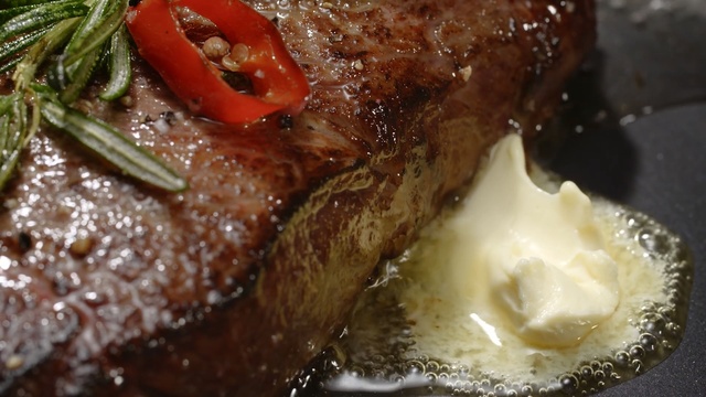 Video Reference: steak, meat, dish, roasting, roast beef, rib eye steak, beef, animal source foods, sirloin steak, lamb and mutton, Person