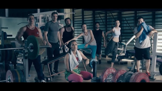 Video Reference: Social group, Physical fitness, Exercise, Indoor cycling, Room, Performance, Muscle, Music, Event, Bodypump, Person