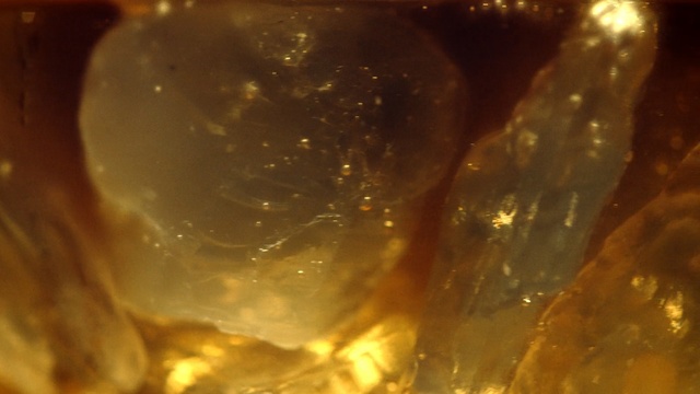 Video Reference: Amber, Yellow, Water, Close-up, Sky, Macro photography, Mineral, Quartz, Caramel color, Photography