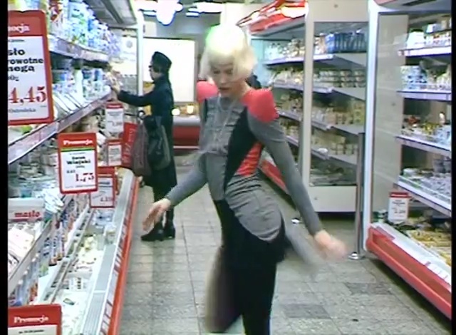 Video Reference: Supermarket, Convenience store, Retail, Grocery store, Shopping, Snapshot, Building, Aisle, Customer, Marketplace, Person