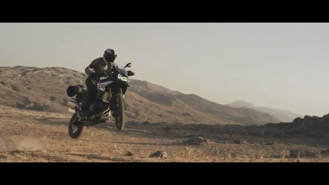 Video Reference: Land vehicle, Motorcycle, Motorcycling, Vehicle, Freestyle motocross, Extreme sport, Motocross, Soil, Stunt performer, Enduro, Person