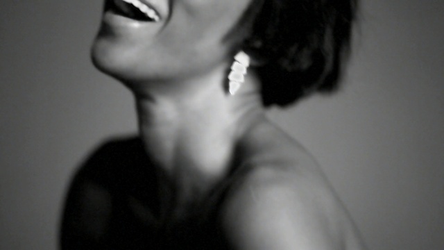 Video Reference: Face, Lip, Hair, Black, White, Photograph, Facial expression, Black-and-white, Shoulder, Skin