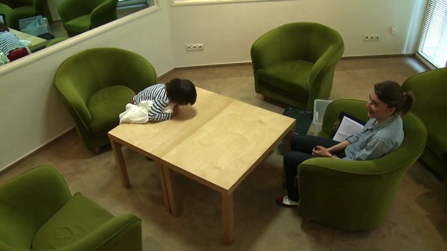 Video Reference: Green, Furniture, Table, Room, Chair, Design, Comfort, Floor, Architecture, Interior design, Person