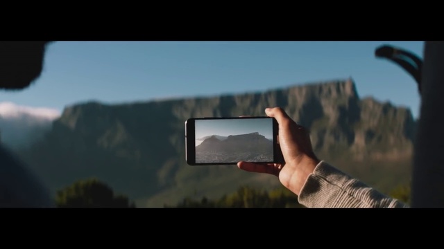 Video Reference: Sky, Hand, Photography, Technology, Gadget, Electronic device, Cloud, Landscape, Screenshot