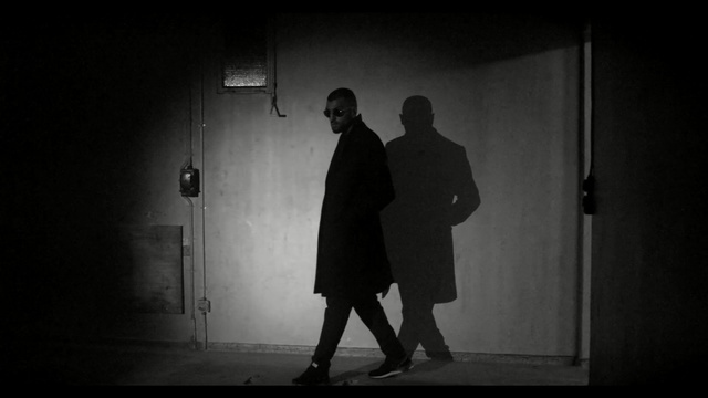 Video Reference: white, black, photograph, black and white, darkness, standing, monochrome photography, light, photography, snapshot, Person