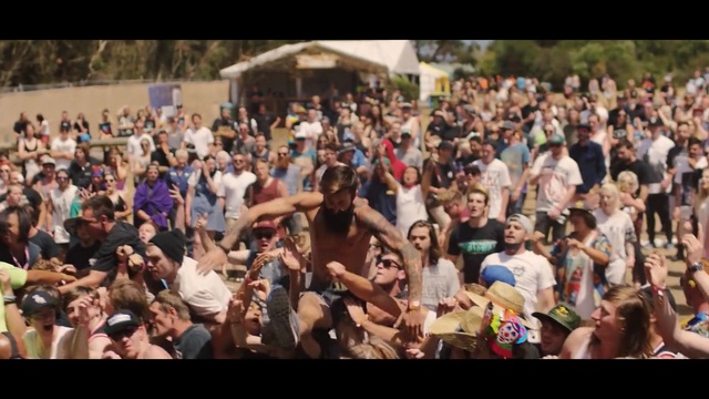 Video Reference: crowd, people, audience, festival, fun, public event, block party, event, spring break, recreation, Person