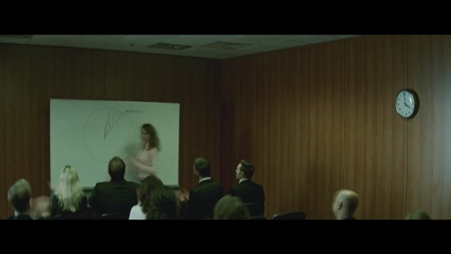 Video Reference: green, public speaking, lecture, presentation, screenshot, conversation, orator, speech, scene, Person