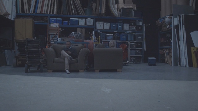 Video Reference: floor, darkness, flooring, Person