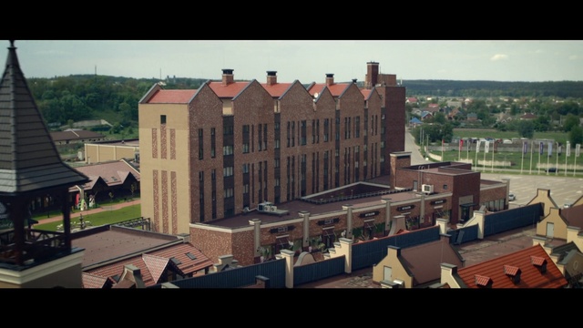 Video Reference: Landmark, Architecture, Building, Urban area, Town, City, Human settlement, Roof, Photography, House