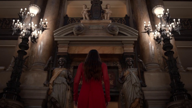 Video Reference: Place of worship, Religious institute, Basilica, Church, Cathedral, Temple, Shrine, Building, Person, Indoor, Room, Front, Living, Sitting, Man, Table, Large, White, Fireplace, Standing, Light, Lit, Fire, Old, Kitchen, Mirror, Walking, Dog, Clock, Bedroom, Bed, Night, Statue, Wall, Clothing, Woman, Human face