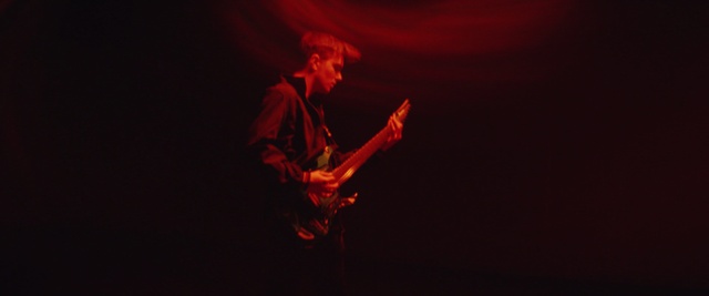 Video Reference: Performance, Red, Performing arts, Performance art, Darkness, Event, Human body, Concert, Stage, Musician, Person