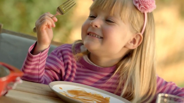 Video Reference: Child, Eating, Toddler, Junk food, Meal, Food, Play, Sharing, Breakfast, Person