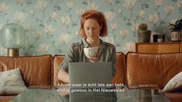 Video Reference: Couch, Head, Furniture, Interior design, Living room, Room, Wall, Sitting, Wallpaper, Human