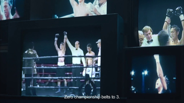 Video Reference: Sport venue, Display device, Stage, Performance, Boxing ring, Media, Technology, Performance art, Flat panel display, Electronic device