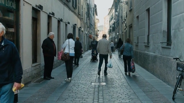 Video Reference: Street, Alley, Road, Town, Pedestrian, Sidewalk, Walking, Lane, Public space, Neighbourhood, Person