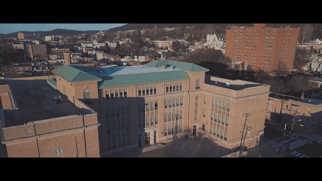 Video Reference: Urban area, Landmark, City, Sky, Architecture, Human settlement, Building, Town, Roof, Downtown