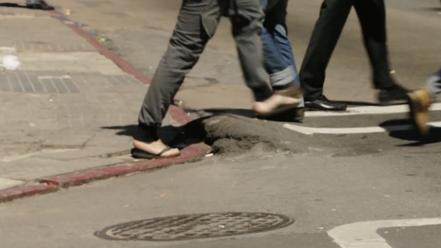 Video Reference: Sidewalk, Asphalt, Public space, Leg, Road surface, Snapshot, Pedestrian, Footwear, Floor, Infrastructure