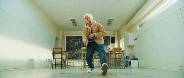 Video Reference: Standing, Fun, Room, Performance, Floor, Performance art, Indoor, Person, Ceiling, Man, Jumping, Young, Riding, Air, Game, Doing, Shirt, Boy, Trick, Board, Holding, Flying, Table, Wall, Furniture, Chair, Footwear, Clothing, Sport, Jeans