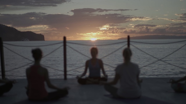 Video Reference: Sky, Water, Sunset, Physical fitness, Horizon, Sea, Calm, Yoga, Sunrise, Evening, Person