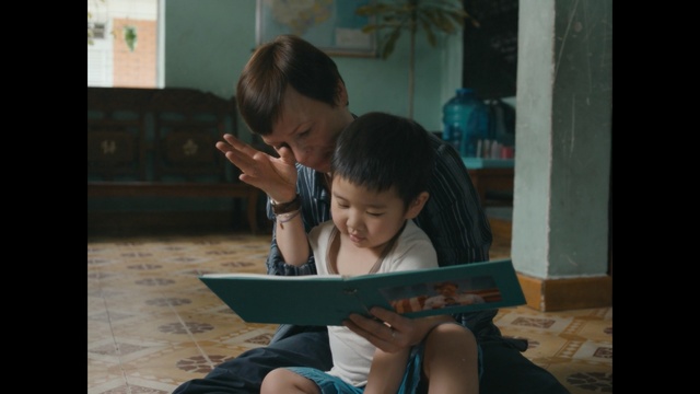 Video Reference: Child, Reading, Sitting, Learning, Person