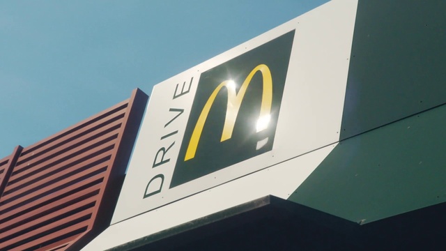 Video Reference: Building, Sky, Automotive design, Gas, Font, Rectangle, Facade, City, Signage, Logo