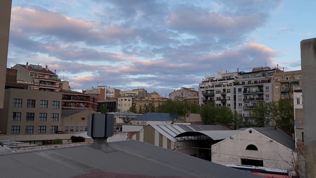 Video Reference: Sky, Neighbourhood, Residential area, Urban area, Daytime, Town, City, Cloud, Human settlement, Roof