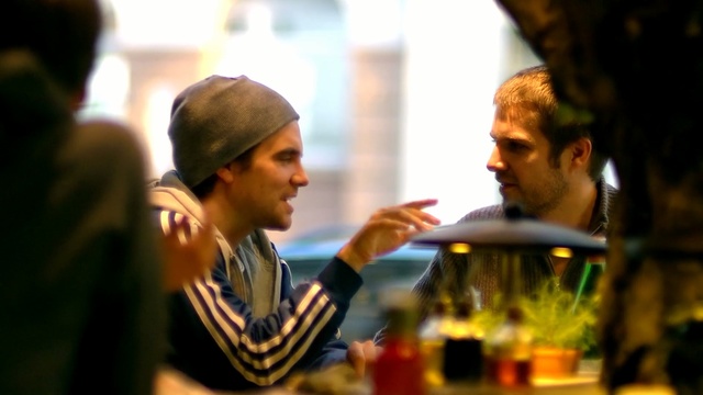 Video Reference: drink, alcohol, conversation, event, restaurant, distilled beverage, Person