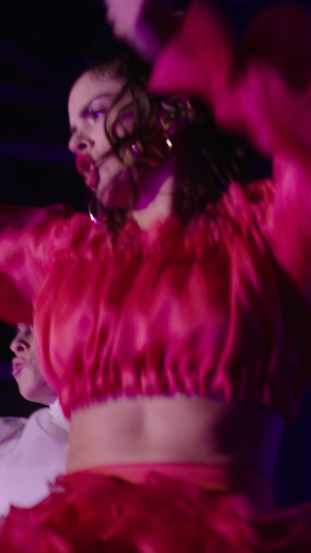 Video Reference: pink, entertainment, performance, magenta, purple, beauty, dancer, performing arts, performance art, event, Person