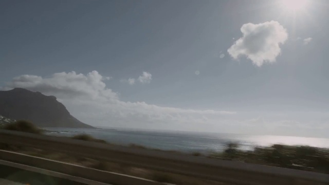 Video Reference: Sky, Cloud, Road, Cumulus, Sea, Infrastructure, Horizon, Atmosphere, Highway, Highland