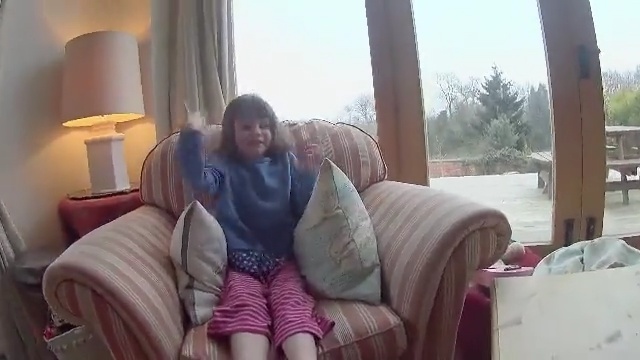 Video Reference: hair, human hair color, blond, girl, mouth, leg, sitting, interaction, hand, finger, Person