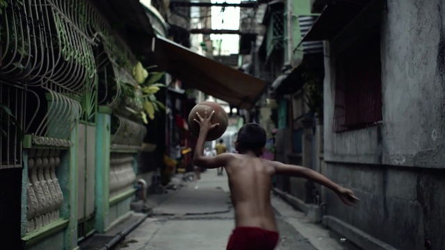 Video Reference: Alley, Street, Mode of transport, Snapshot, Town, Human settlement, Neighbourhood, Infrastructure, Road, Human