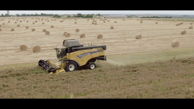 Video Reference: field, hay, agricultural machinery, grassland, agriculture, mode of transport, vehicle, farm, harvester, soil