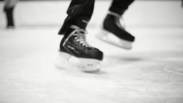 Video Reference: Ice hockey equipment, White, Ice skate, Footwear, Ice skating, Figure skate, Ice rink, Shoe, Skating, Black-and-white