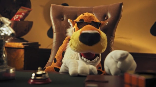 Video Reference: Stuffed toy, Plush, Toy, Animation, Snout, Canidae, Games, Mascot, Bull terrier, Person