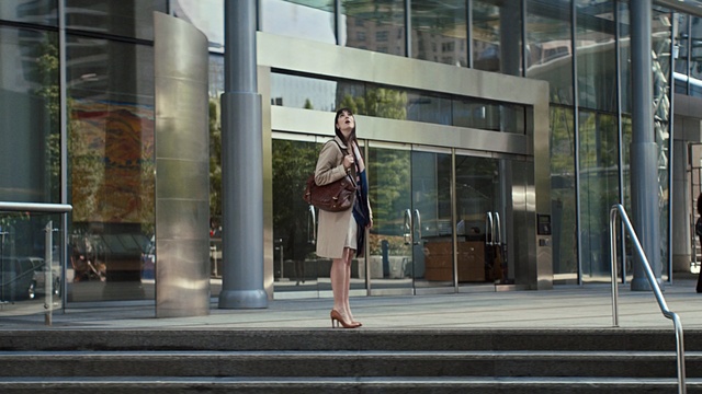 Video Reference: urban area, building, city, window, street, pedestrian, road, facade