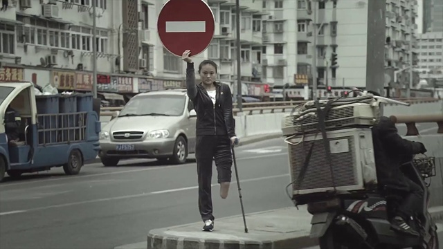 Video Reference: Car, Vehicle, Mode of transport, Snapshot, Street, Urban area, Pedestrian, Traffic sign, Road, Photography