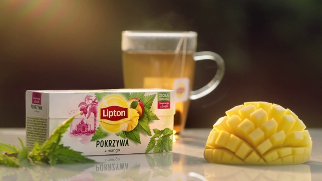 Video Reference: Product, Chrysanthemum tea, Ananas, Yellow, Food, Pineapple, Plant, Lemon, Flower, Herb, Cup, Table, Coffee, Sitting, Glass, Fruit, Slice, Paper, Plate, Orange, Small, Tray, Phone, Cake, Oranges, Desk, Sandwich, White, Drink, Soft drink, Fast food, Juice, Snack, Beverage, Bottle