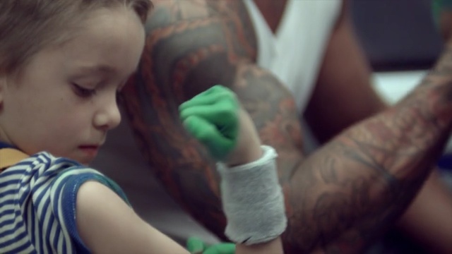 Video Reference: green, child, skin, hand, finger, girl, arm, toddler, mouth, human, Person