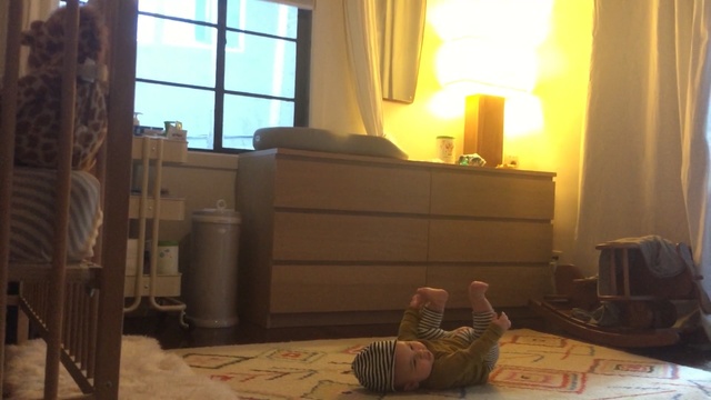 Video Reference: room, property, home, furniture, living room, interior design, wall, floor, window, flooring, Person